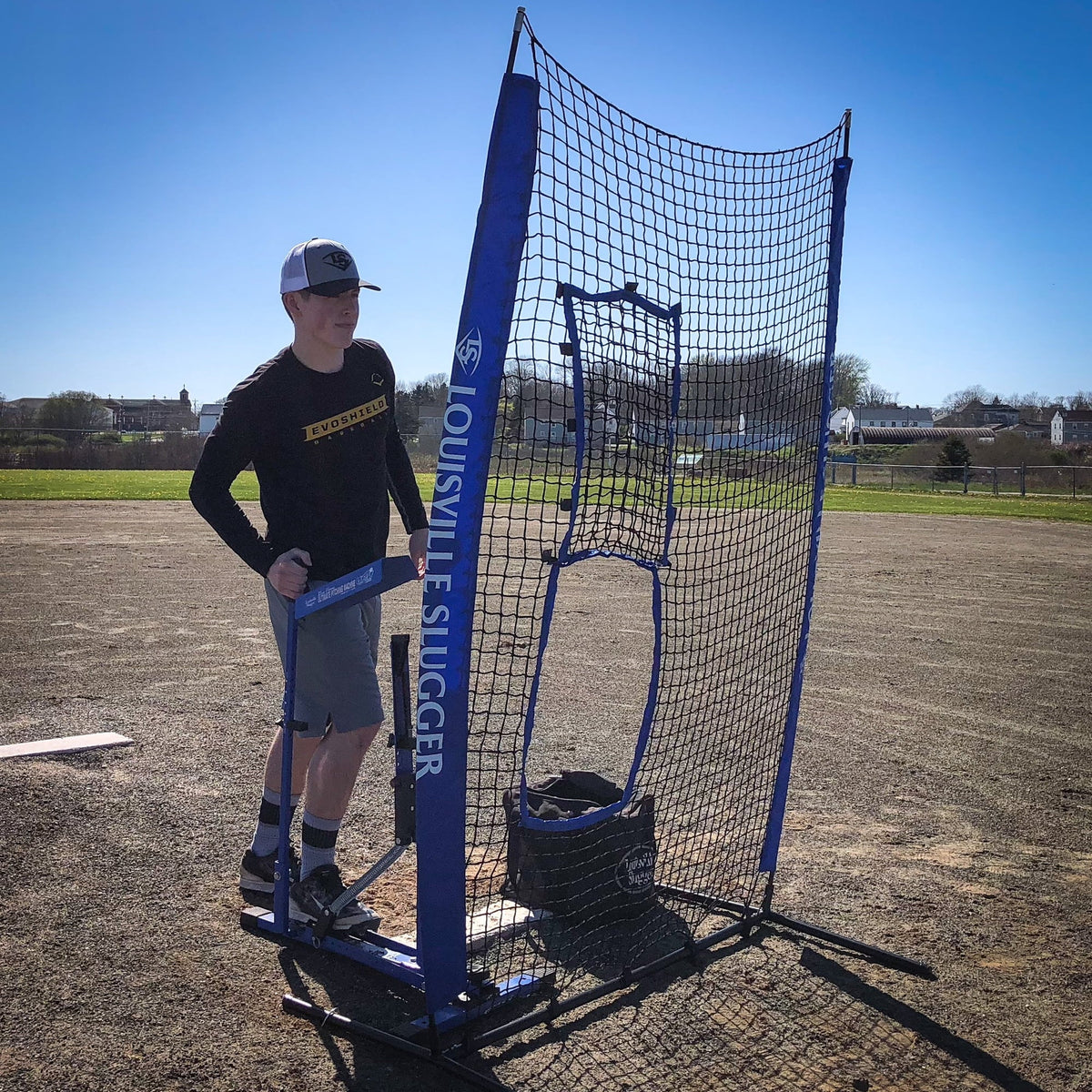 Louisville Slugger Blue Flame Pitching Machine – Manual Baseball & Softball Trainer, Throws Up to 60 MPH, Youth & Adult Practice Tool