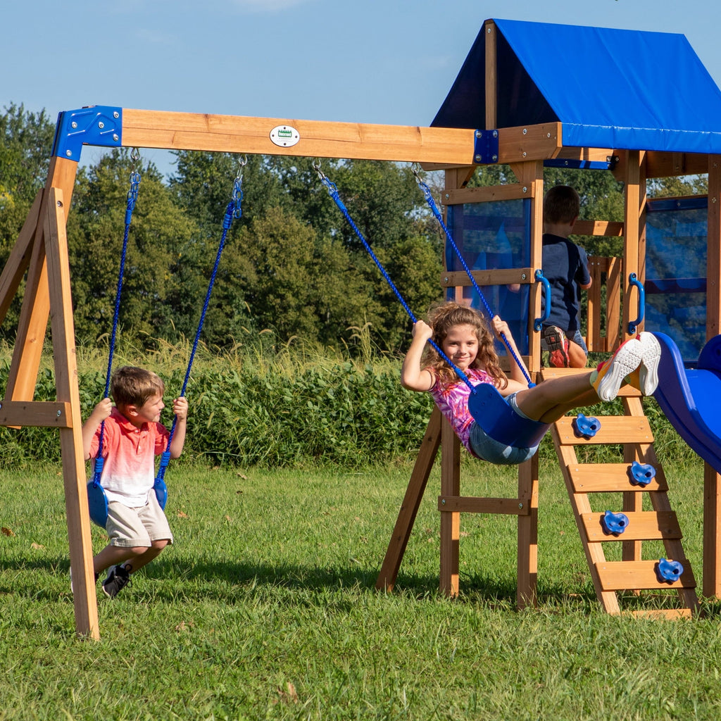 Backyard Discovery Aurora Cedar Wood Swing Set, Wave Slide, Play Deck, Rock Wall Ladder